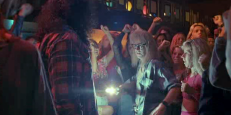 Garth Algar makes his way through busy crowd