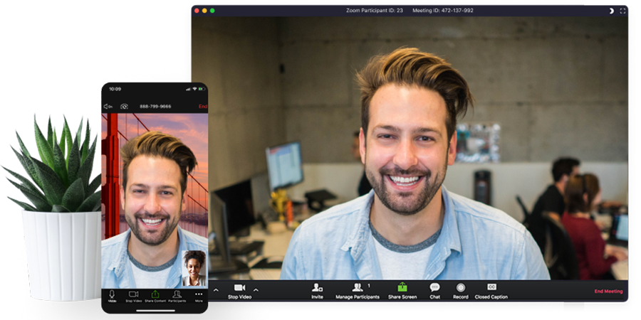 This smiling man using Zoom on his phone and browser has no idea he's disconnected from his coworkers.